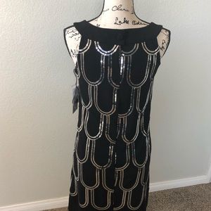 Black and sequin detail sleeveless dress. NWT